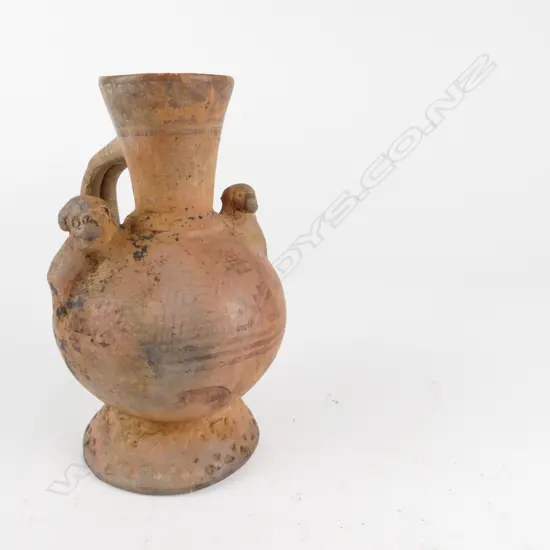 An antique pottery jug