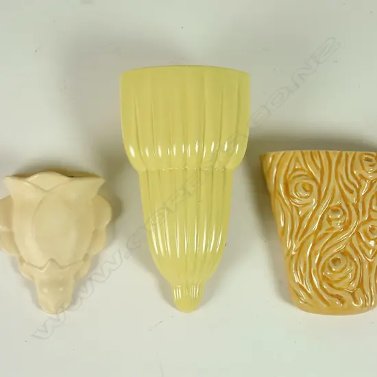 Three Crown Lynn coloured wall pockets