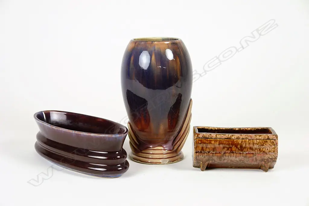 Three Amalgamated pottery vases Image 1++