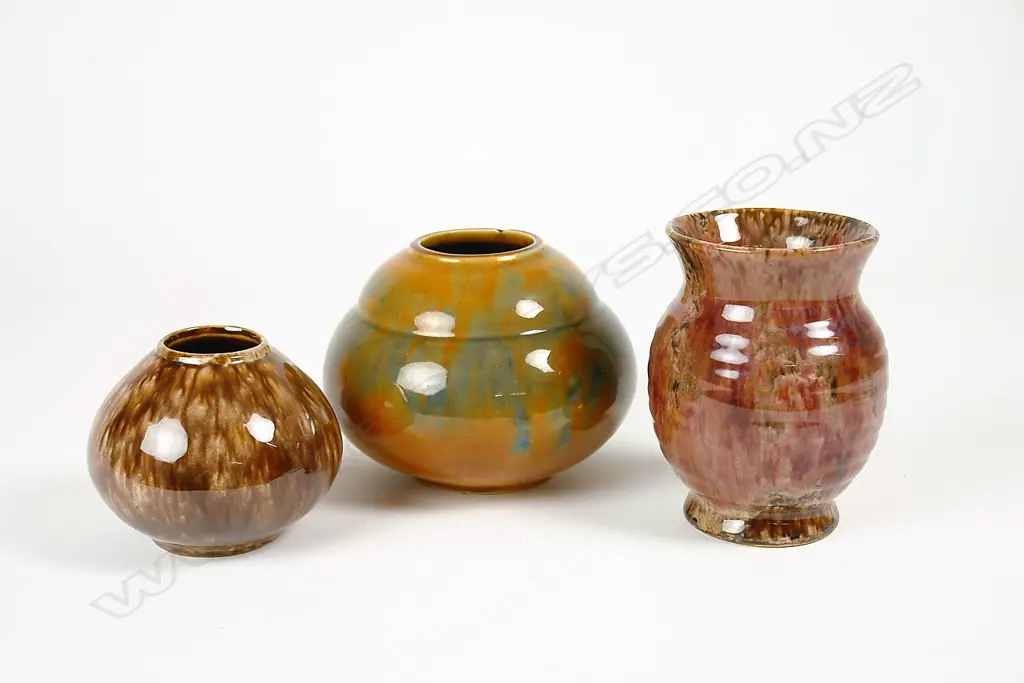 Three Amalgamated pottery vases Image 1++