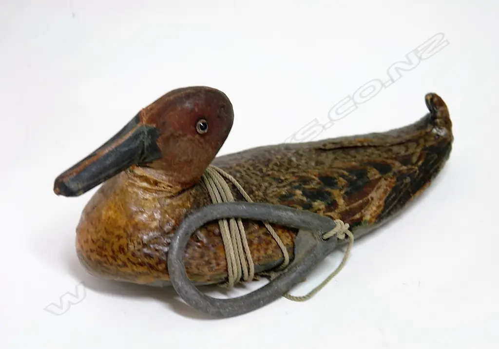 An unusual fine weave canvas oil skin hen duck decoy Image 1++