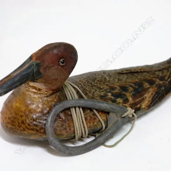 An unusual fine weave canvas oil skin hen duck decoy