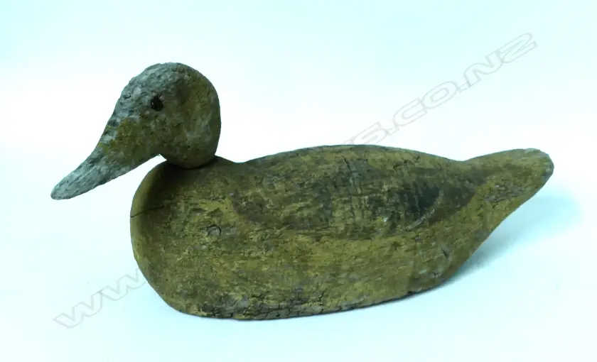 A well weathered 15½" wooden mallard hen decoy Image 1++