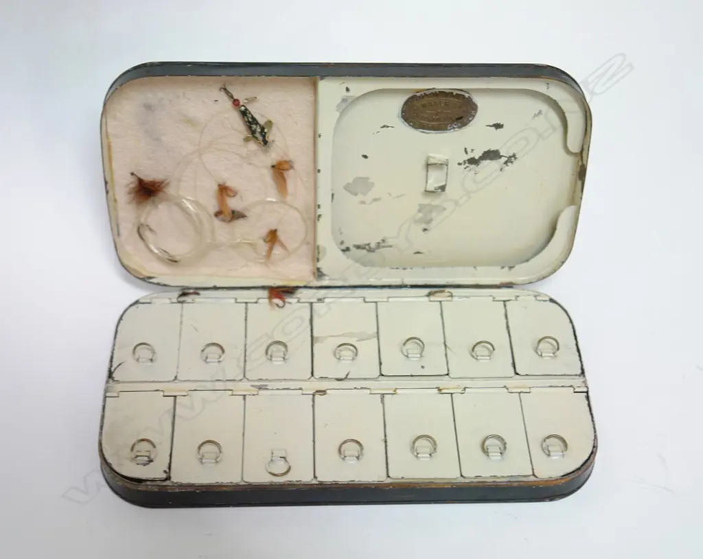 A large c.1910 Ogden Smith 14 compartment metal fly box Image 1++