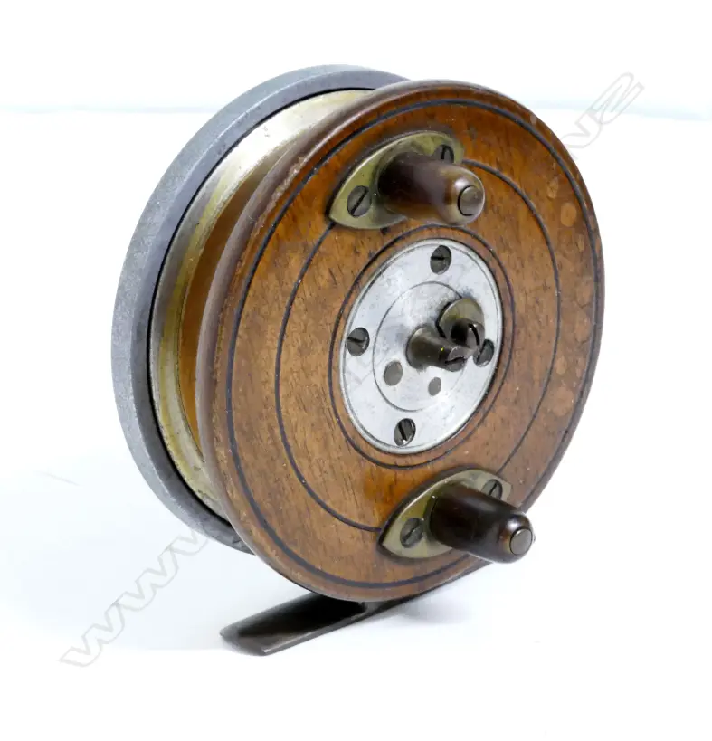 A walnut and aluminium 'transitional' reel Image 1++