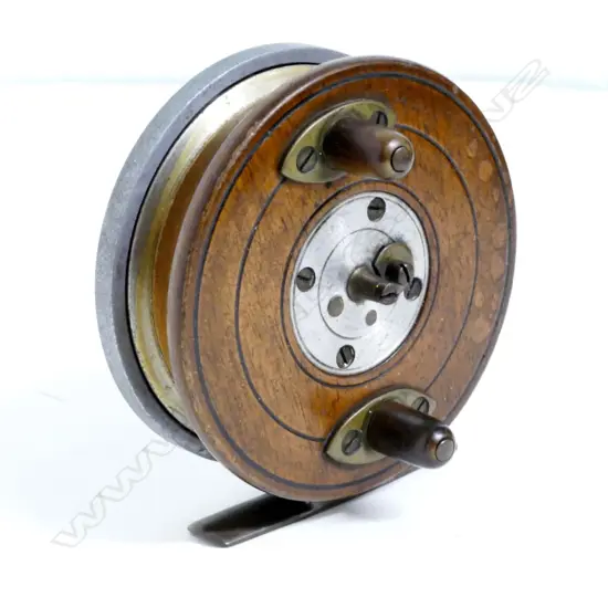 A walnut and aluminium 'transitional' reel