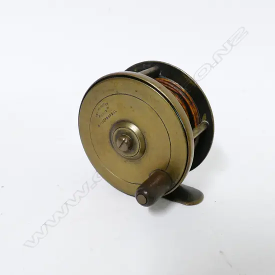A 2½" McCarthys (Dunedin) brass centre pin reel