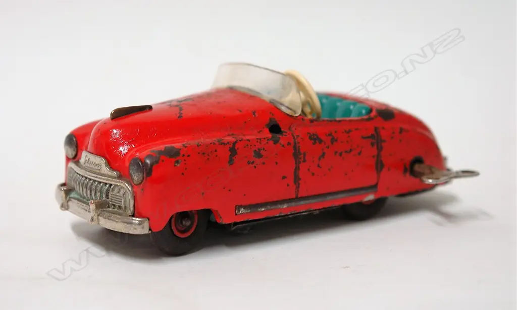 A Schuco Radio 4012 wind-up tinplate car Image 1++
