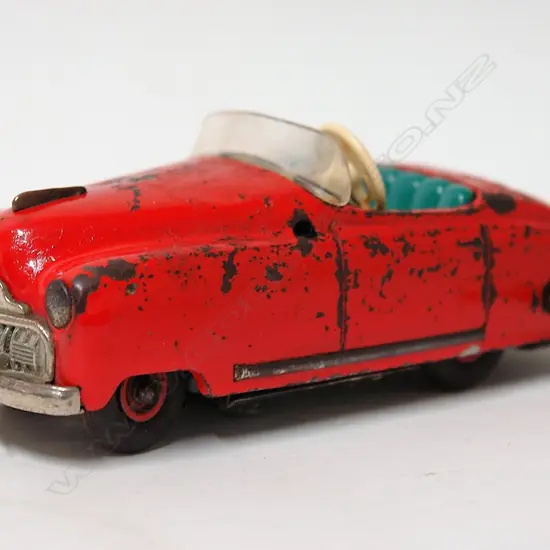 A Schuco Radio 4012 wind-up tinplate car