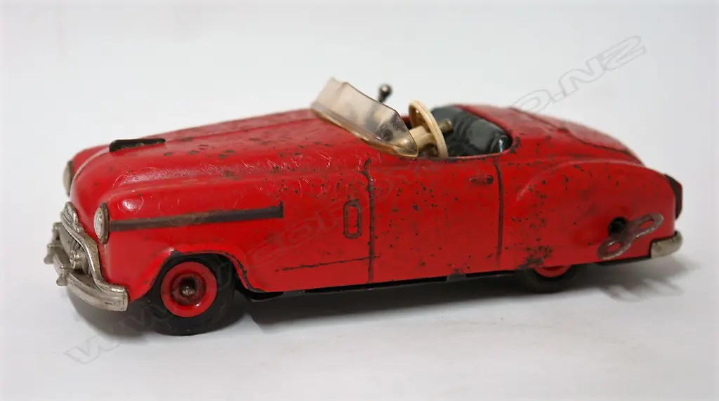 A Schuco 1950s Combinato 4003 tin plate wind-up convertible toy car Image 1++