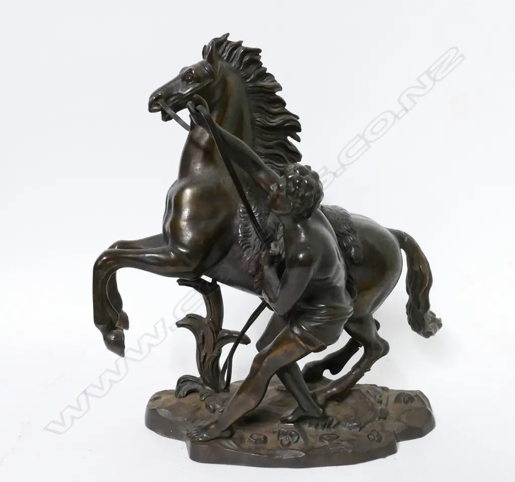A replica bronze statuette of a Marly horse and trainer Image 1++
