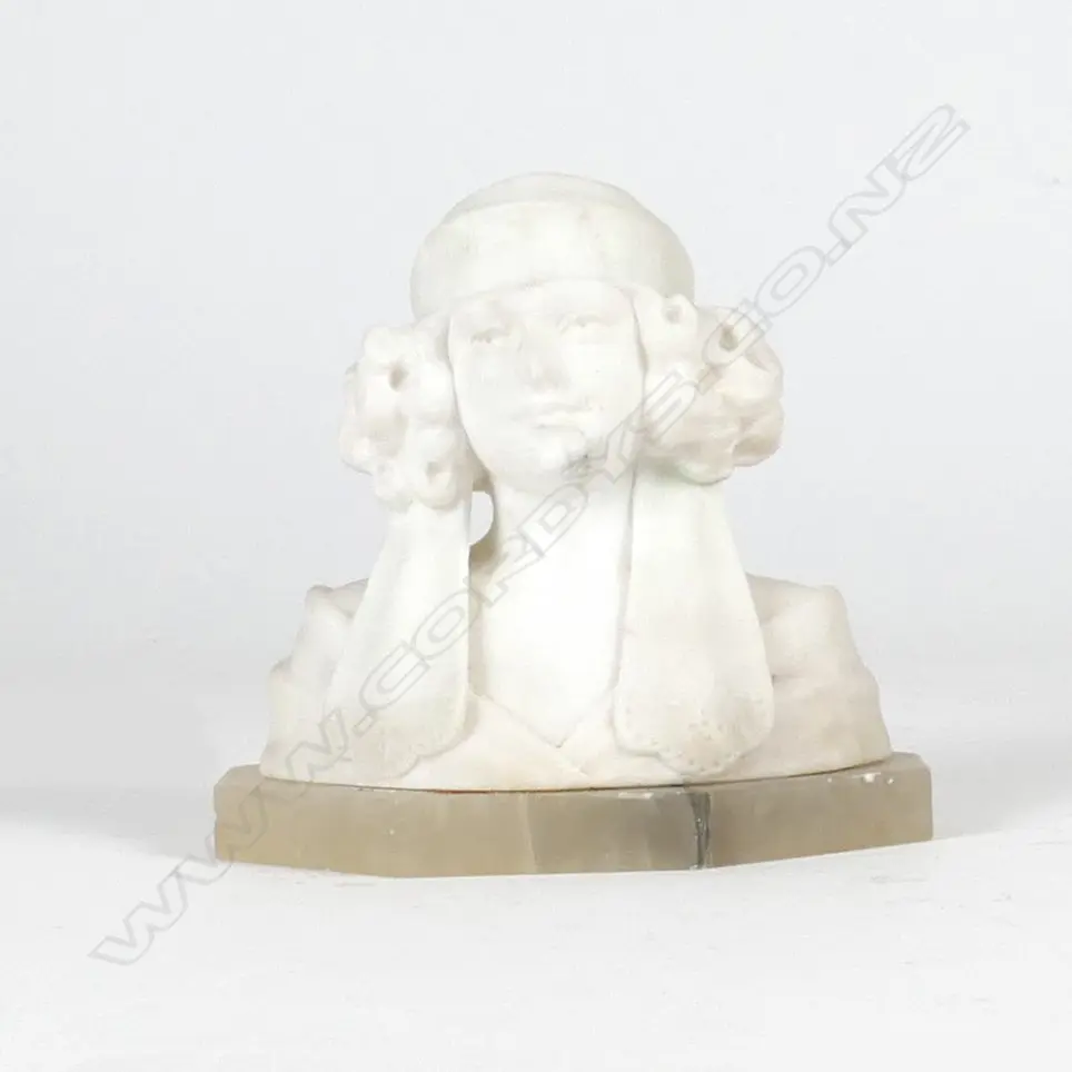 A small white marble bust of a 1920s girl on a hexagonal alabaster plinth base Image 1++