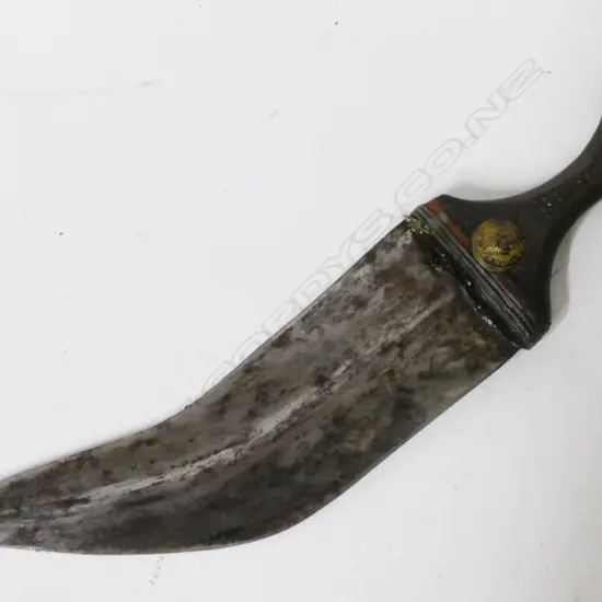 An early 20thC Arab jambiya dagger with scabbard