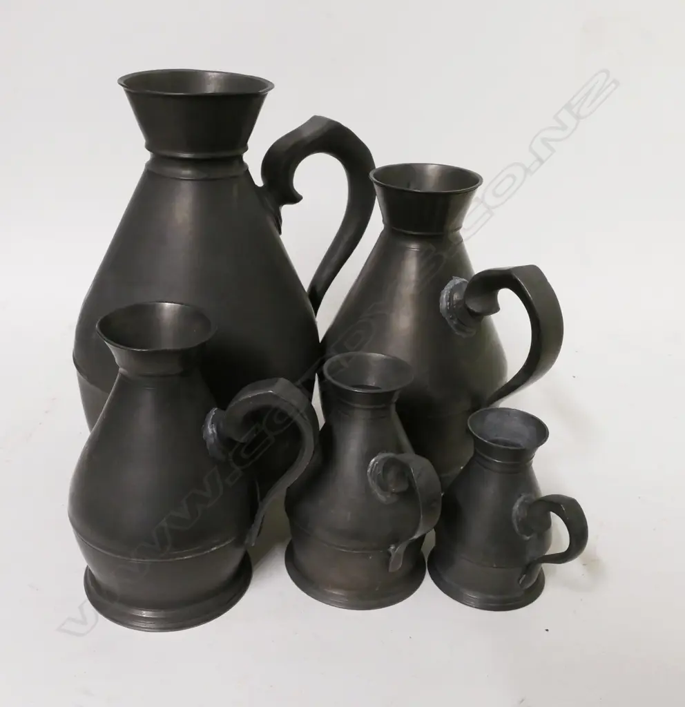 A graduated set of five 19thC Irish haystack pewter measures by Joseph Austin & Son Image 1++