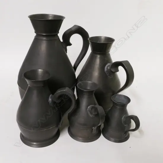 A graduated set of five 19thC Irish haystack pewter measures by Joseph Austin & Son