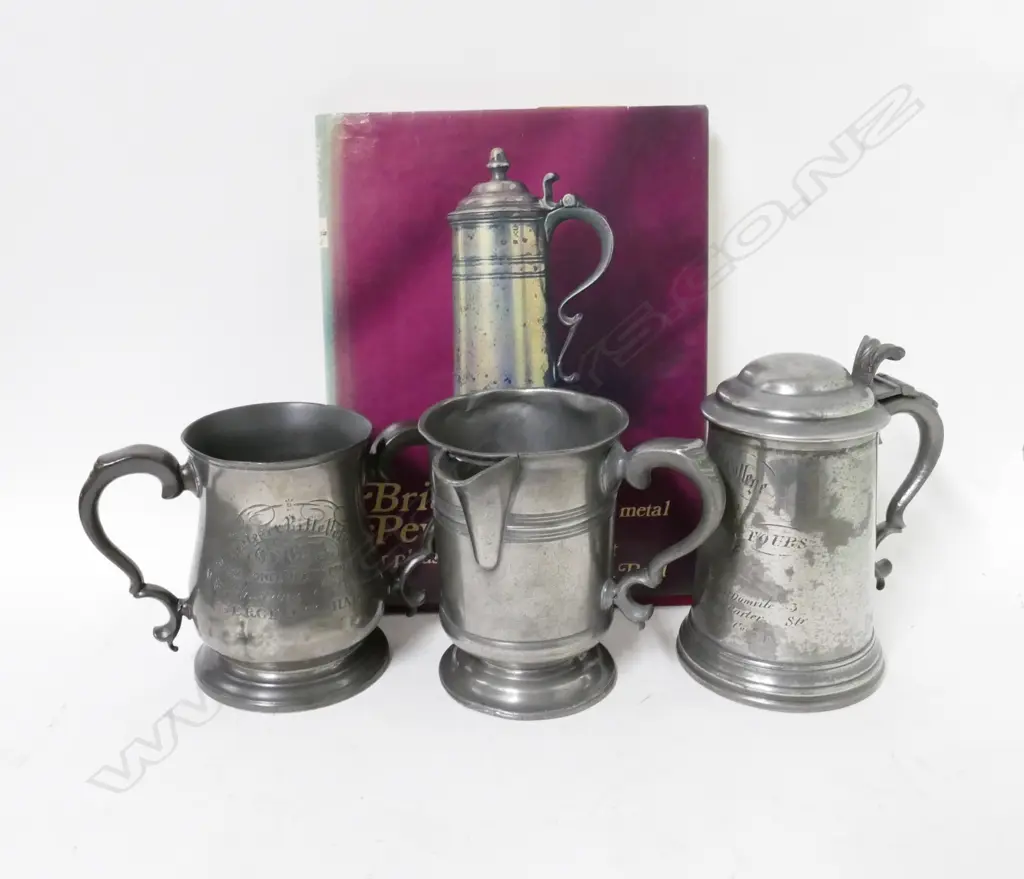 Three pewter vessels and a book Image 1++