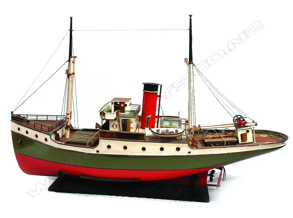 A vintage large model of a tug boat Image 1++