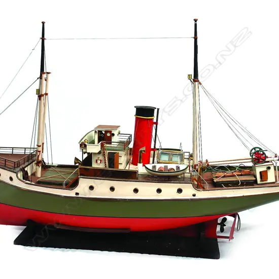 A vintage large model of a tug boat