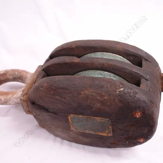 An old wooden ship's double pulley