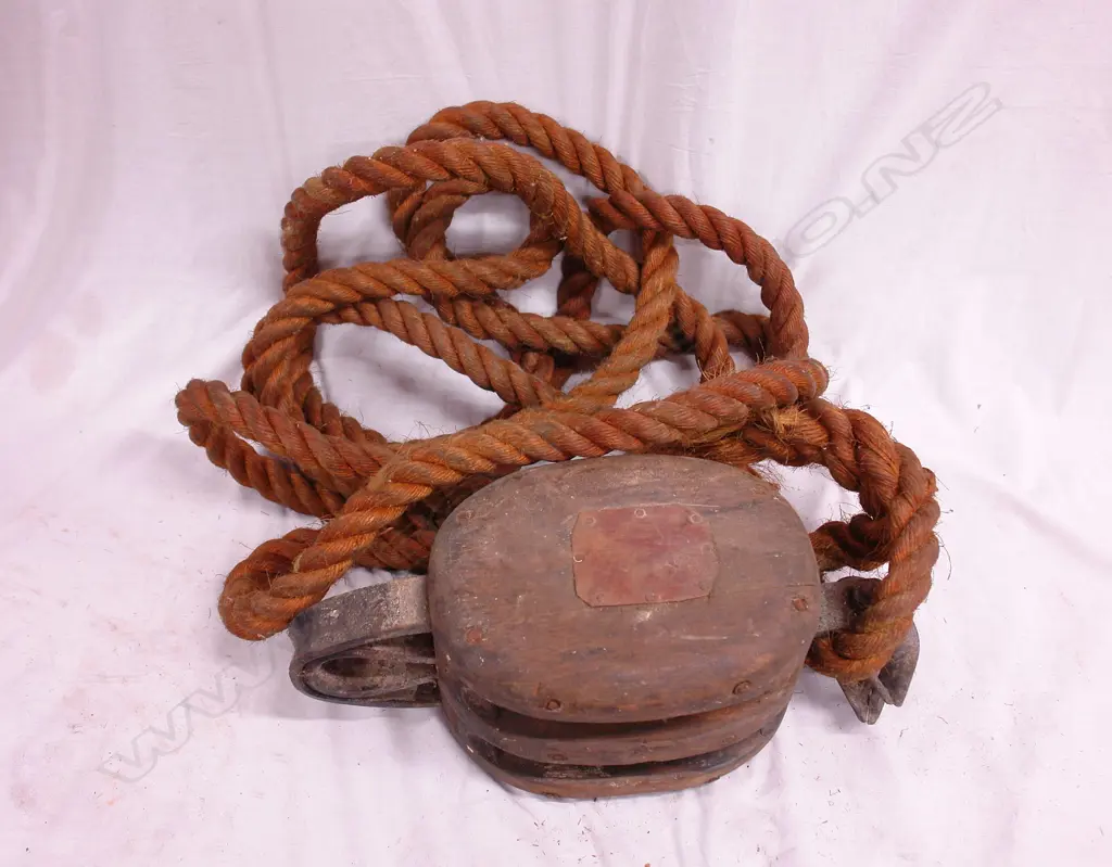 An old ship's wooden pulley Image 1++