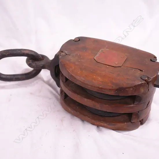 An old mahogany ship's double pulley