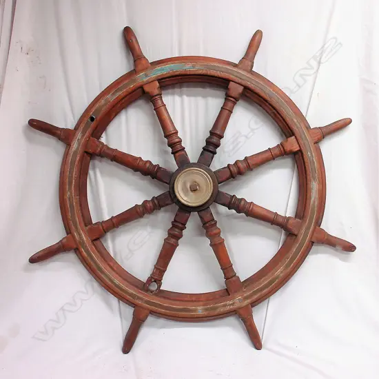 An old ship's teak eight spoke wheel from the "Rahiri"