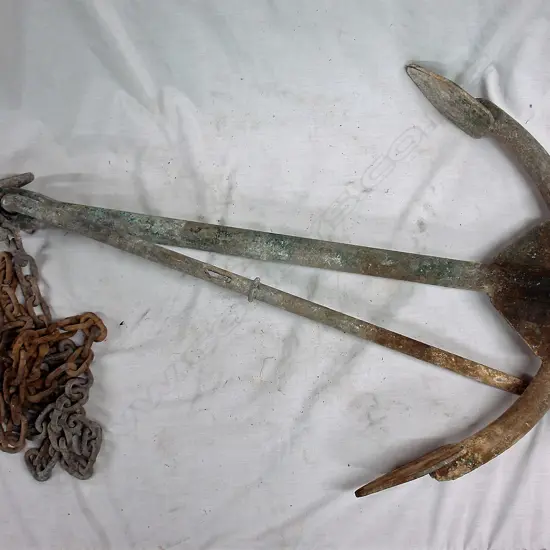 An old galvanised iron ship's Herreshoff anchor with wedge securing the top arm