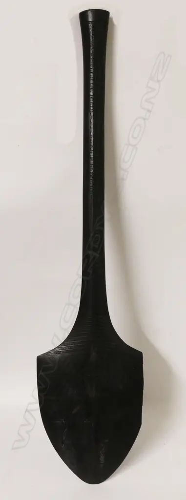 An early 20thC Samoan paddle shaped club Image 1++