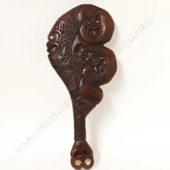 A naïve folk art carved Maori wahaika