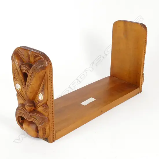 A New Zealand timber Maori carved bookends