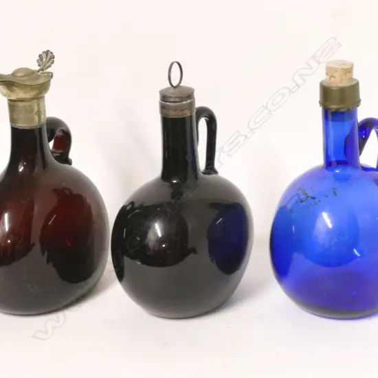 Three glass liqueur flasks