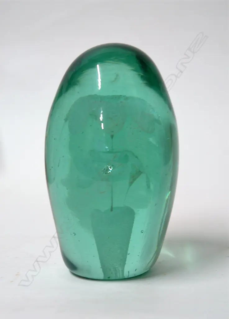 A Victorian green glass dump Image 1++