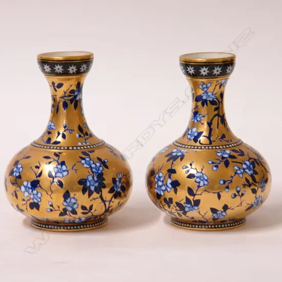 A pair of late 19thC Coalport vases