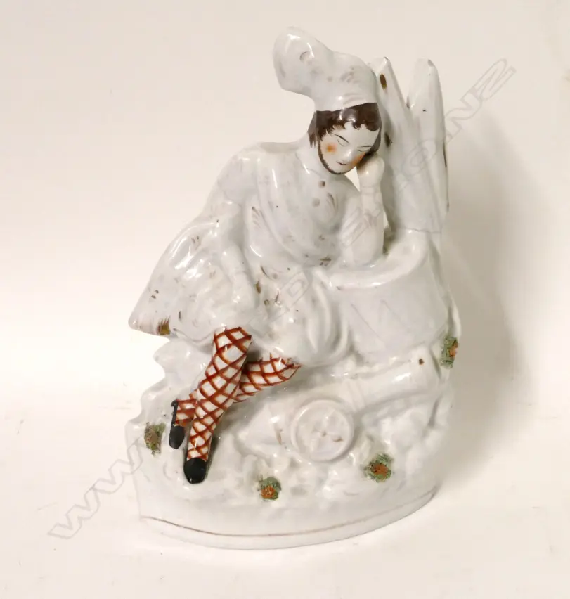 A Staffordshire figure of a resting Scottish soldier Image 1++