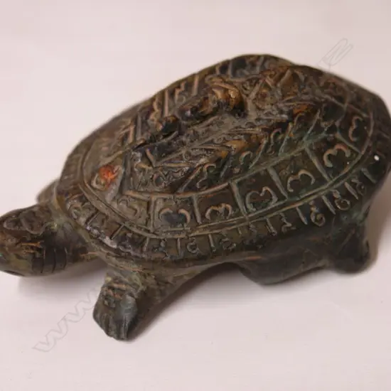 A cast bronze tortoise