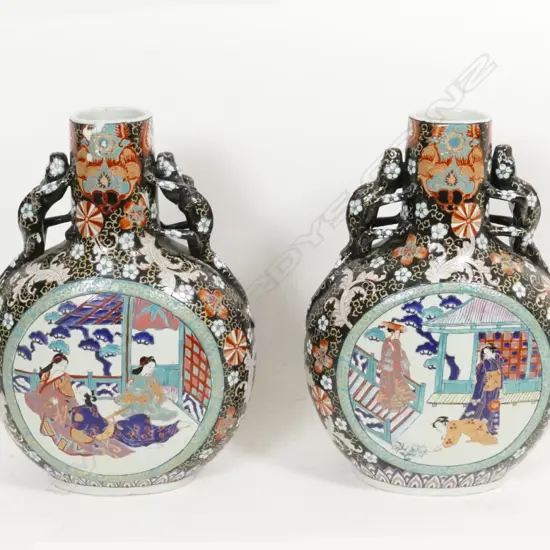 A pair of moon flask vases