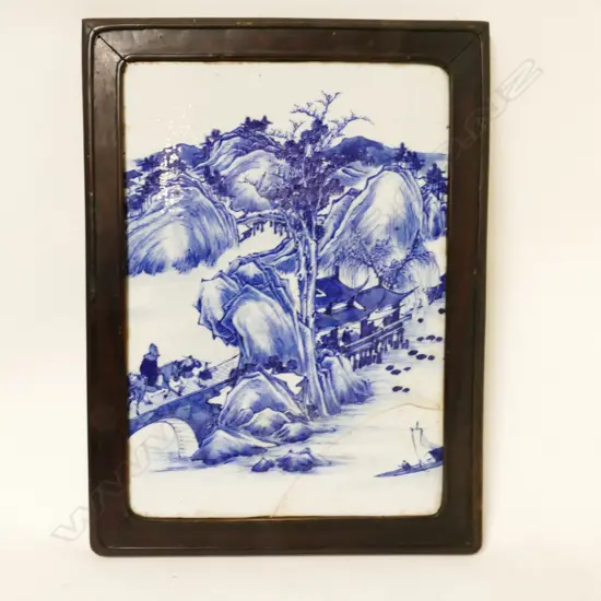 An old Chinese blue and white tile mounted in blackwood frame