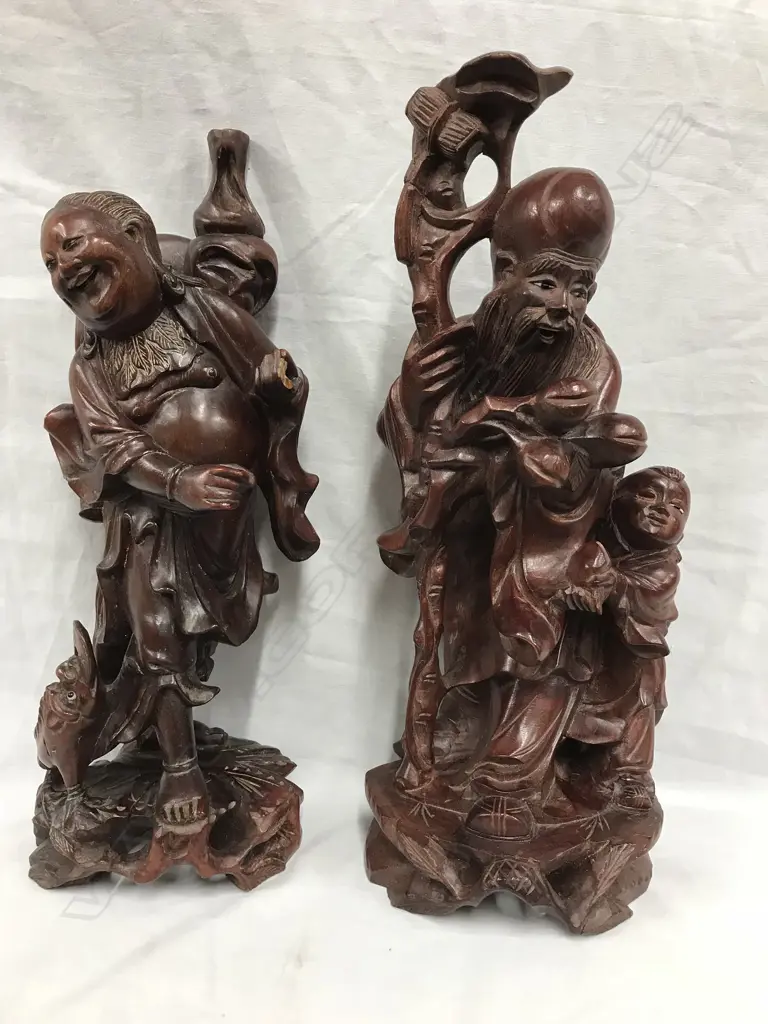 Two rosewood carved figures Image 1++
