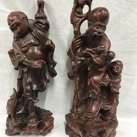 Two rosewood carved figures