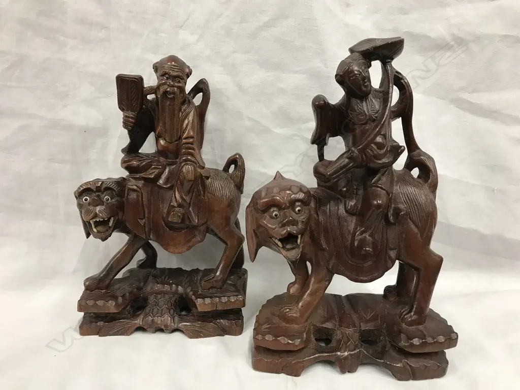 Two Chinese carved rosewood figures Image 1++