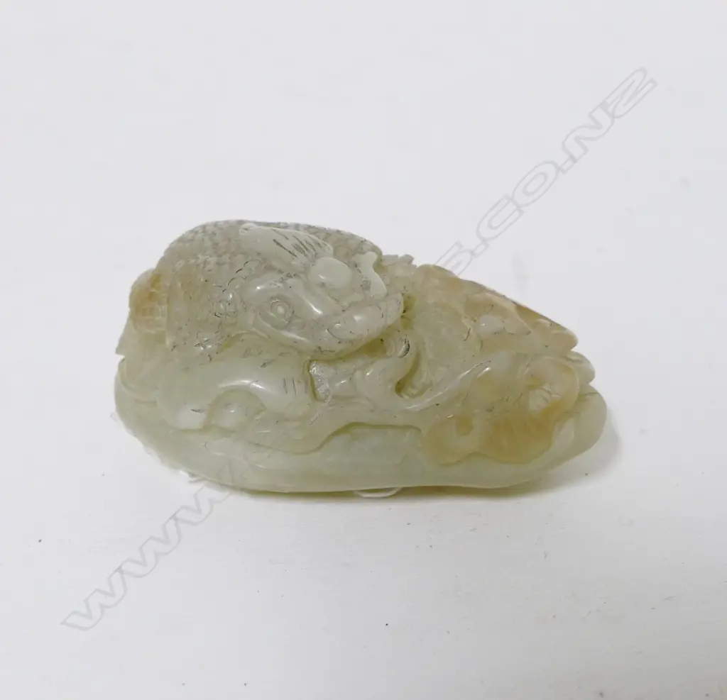 A Chinese jade handling piece Image 1++