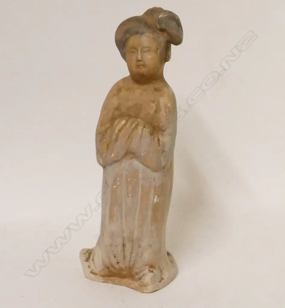 A Chinese Han style funerary figure of a woman Image 1++