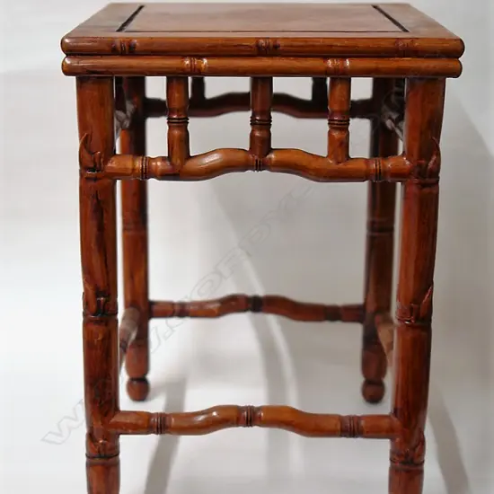 A Chinese carved rosewood vase stand
