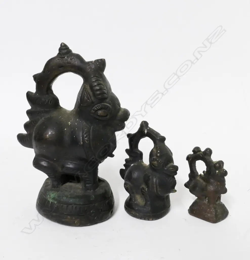 Three Burmese bronze 'opium' weights Image 1++