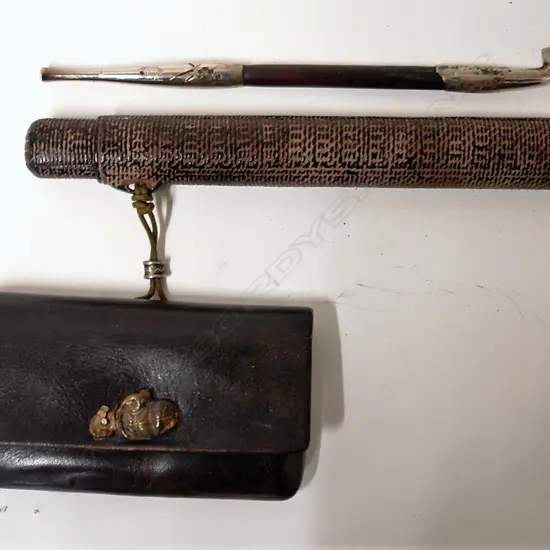 An old Japanese tobacco pipe in case with pouch
