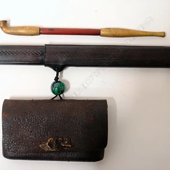 A Japanese smoker's pipe in case with pouch