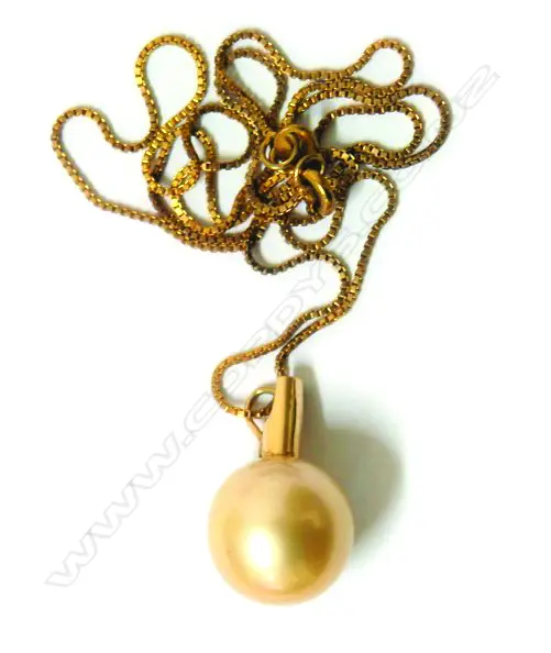 A large cultured golden pearl pendant Image 1++