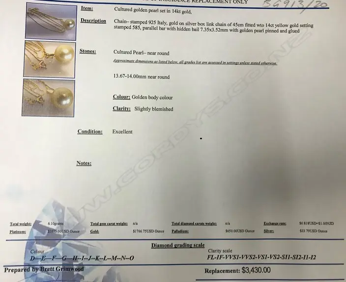 A large cultured golden pearl pendant Image 1++