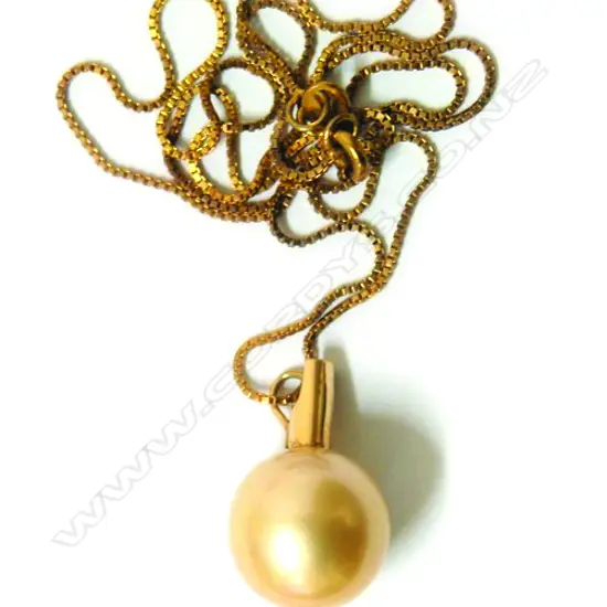 A large cultured golden pearl pendant