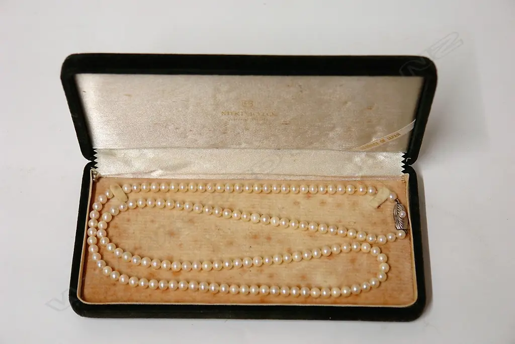 A vintage Mikimoto long strand of cultured pearls Image 1++